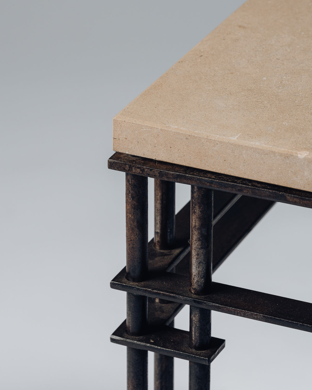 SIDE TABLE IN WROUGHT IRON AND LIMESTONE, JEAN-MICHEL WILMOTTE, 1980s