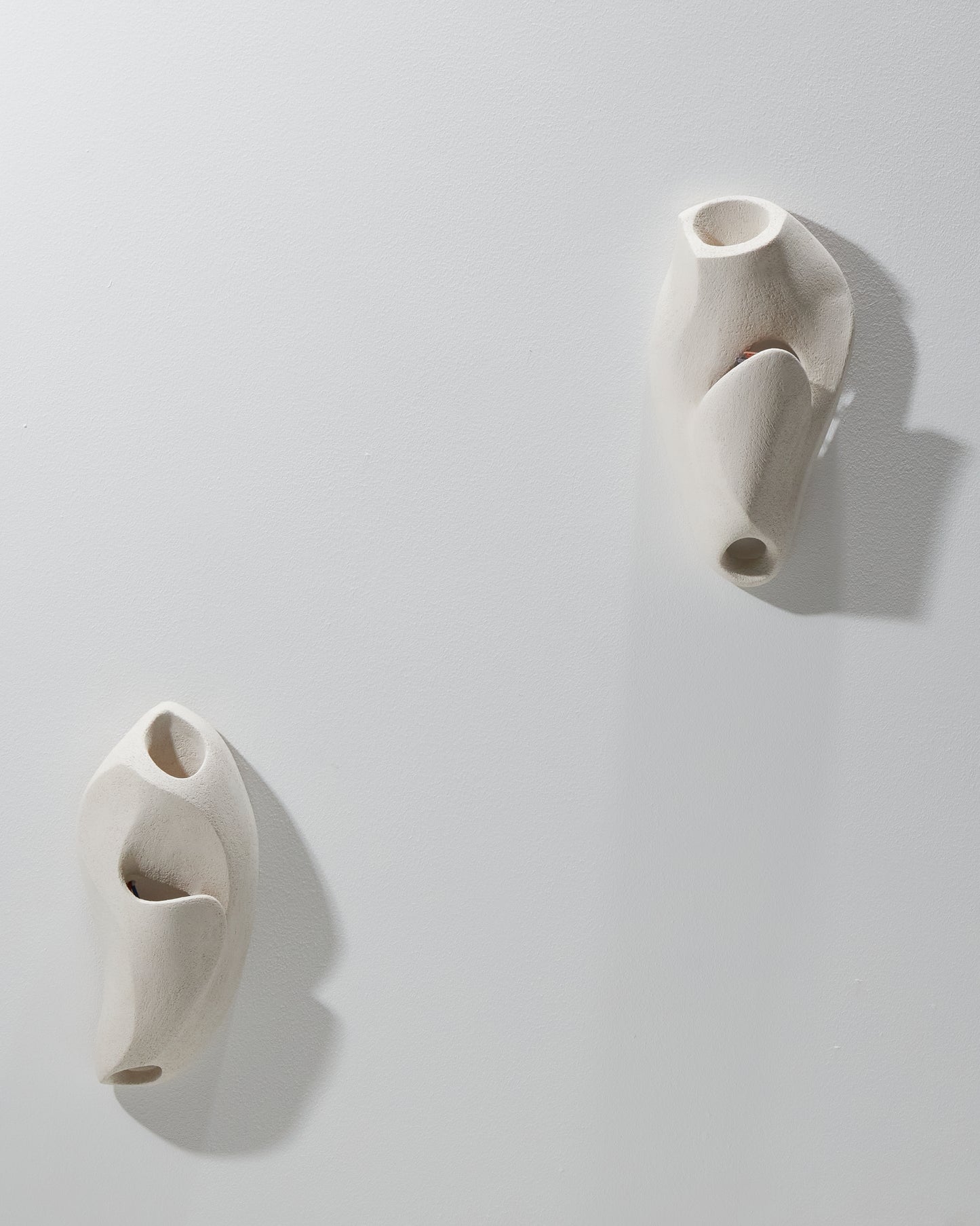 Coral 2 sconce in white sandstone