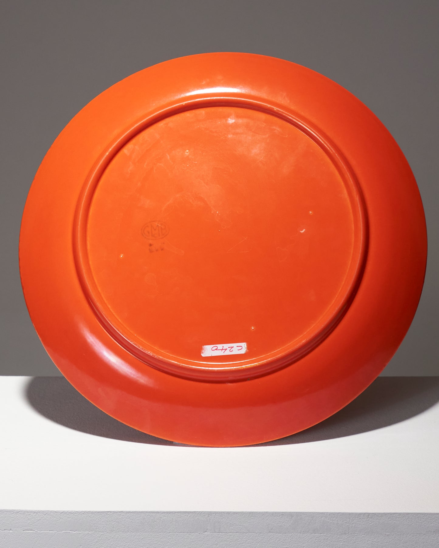 Large orange ceramic dish