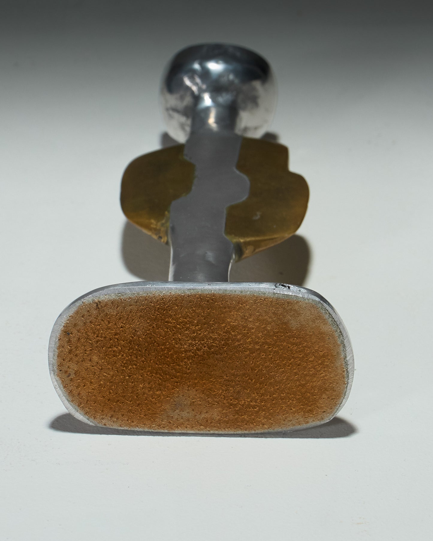 PAIR OF BRUTALIST CANDLESTICKS, 1970s