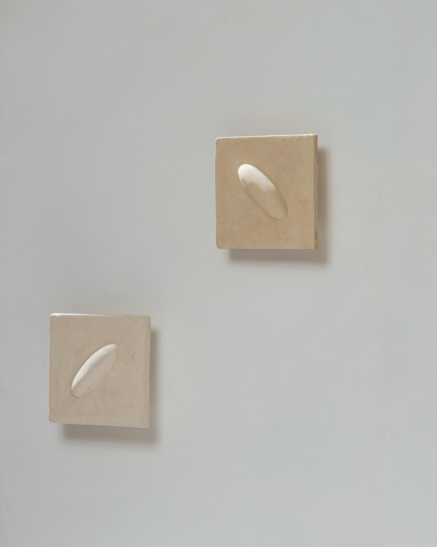 PAIR OF SCULPTURAL CHAMOTTE CLAY SCONCES