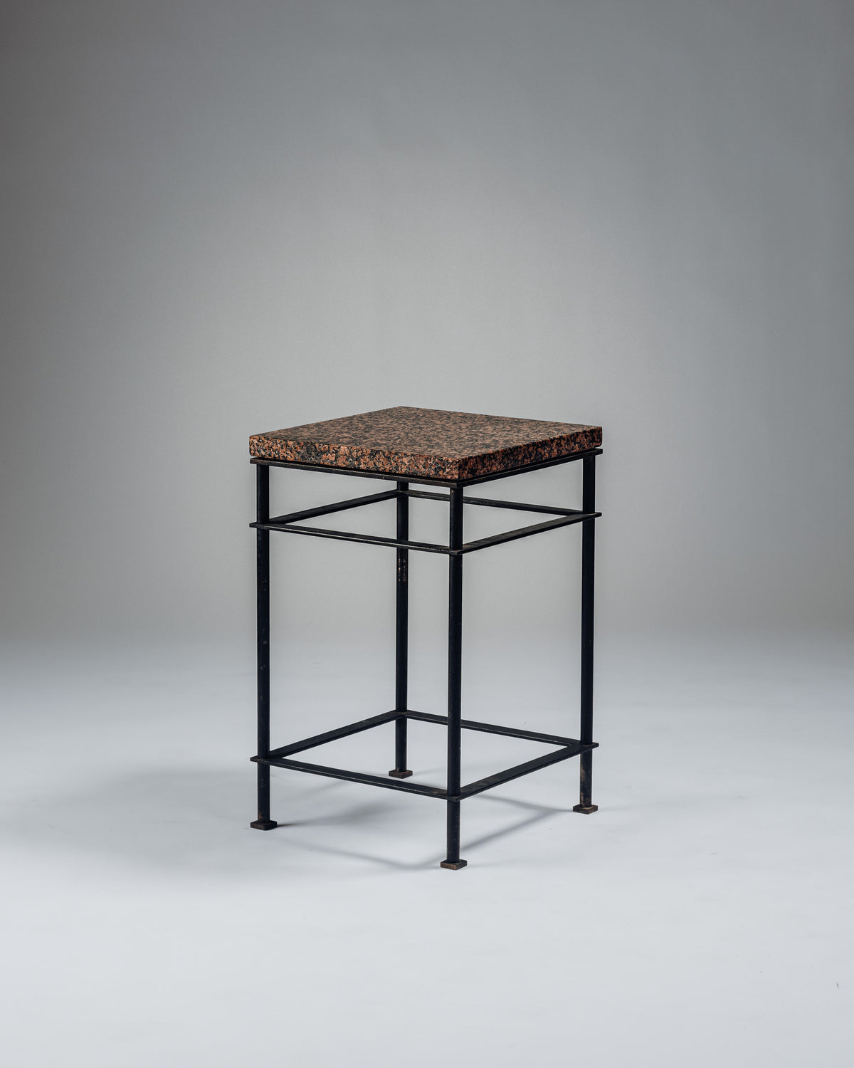 SIDE TABLE IN IRON AND PINK GRANITE, JEAN-MICHEL WILMOTTE, 1980s