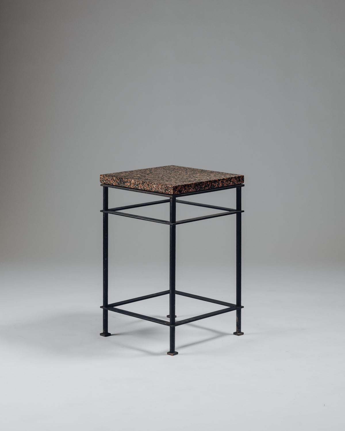 SIDE TABLE IN IRON AND PINK GRANITE, JEAN-MICHEL WILMOTTE, 1980s
