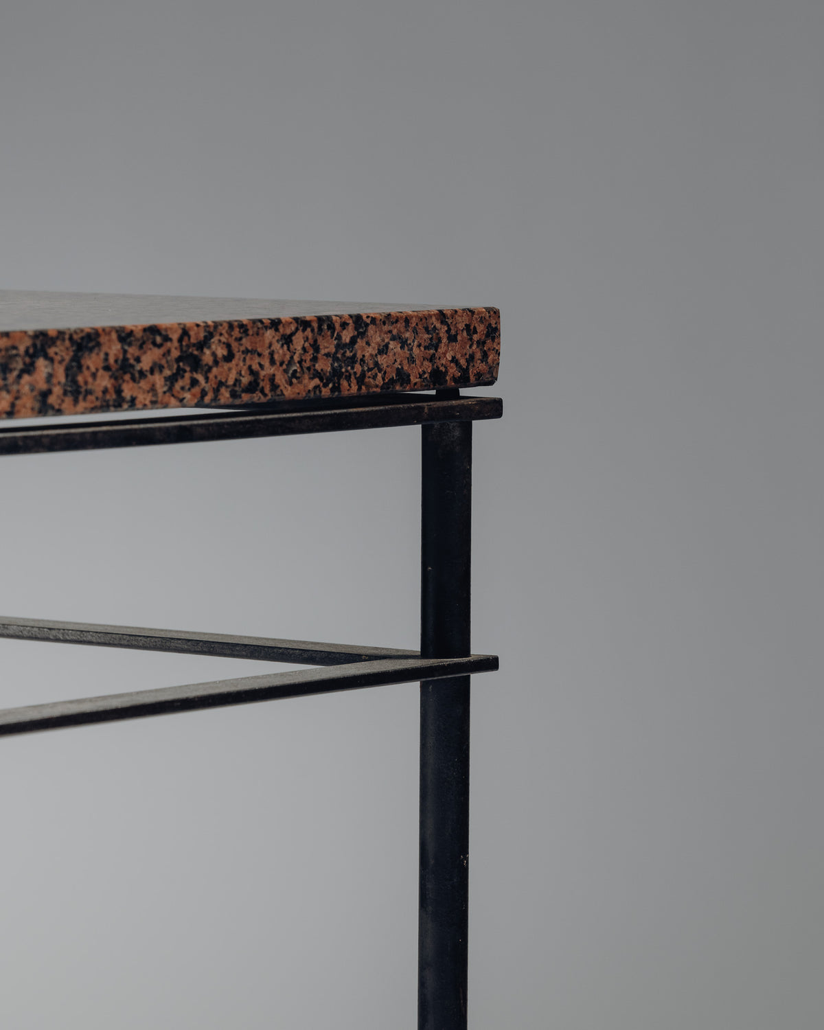 SIDE TABLE IN IRON AND PINK GRANITE, JEAN-MICHEL WILMOTTE, 1980s