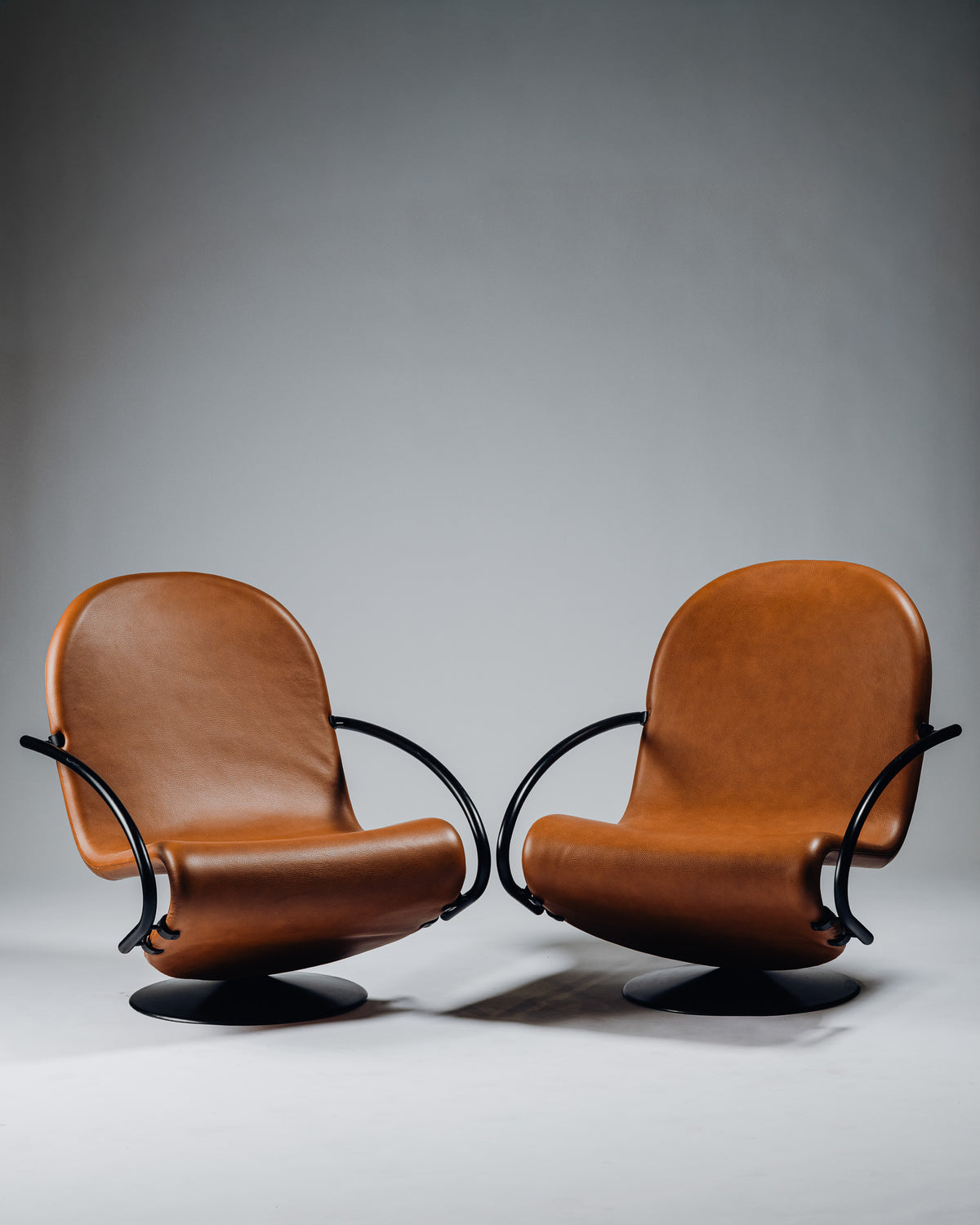 PAIR OF STEEL AND LEATHER ARMCHAIRS, VERNER PANTON, FRITZ HANSEN, 1970s