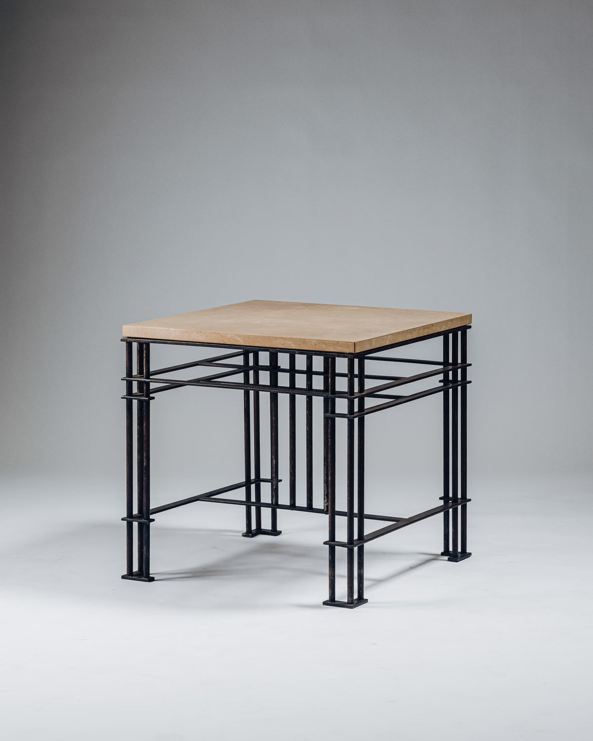SIDE TABLE IN WROUGHT IRON AND LIMESTONE, JEAN-MICHEL WILMOTTE, 1980s