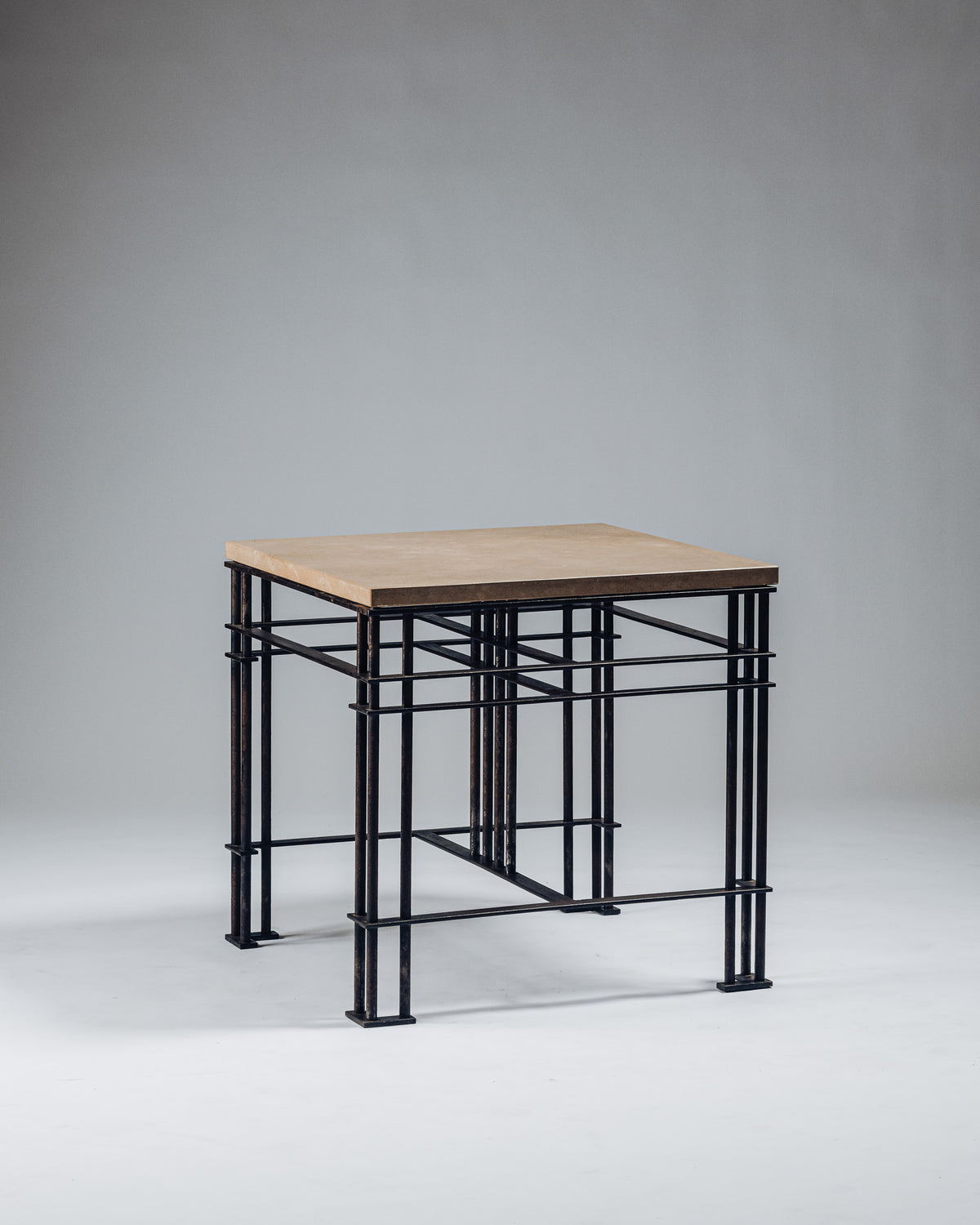 SIDE TABLE IN WROUGHT IRON AND LIMESTONE, JEAN-MICHEL WILMOTTE, 1980s