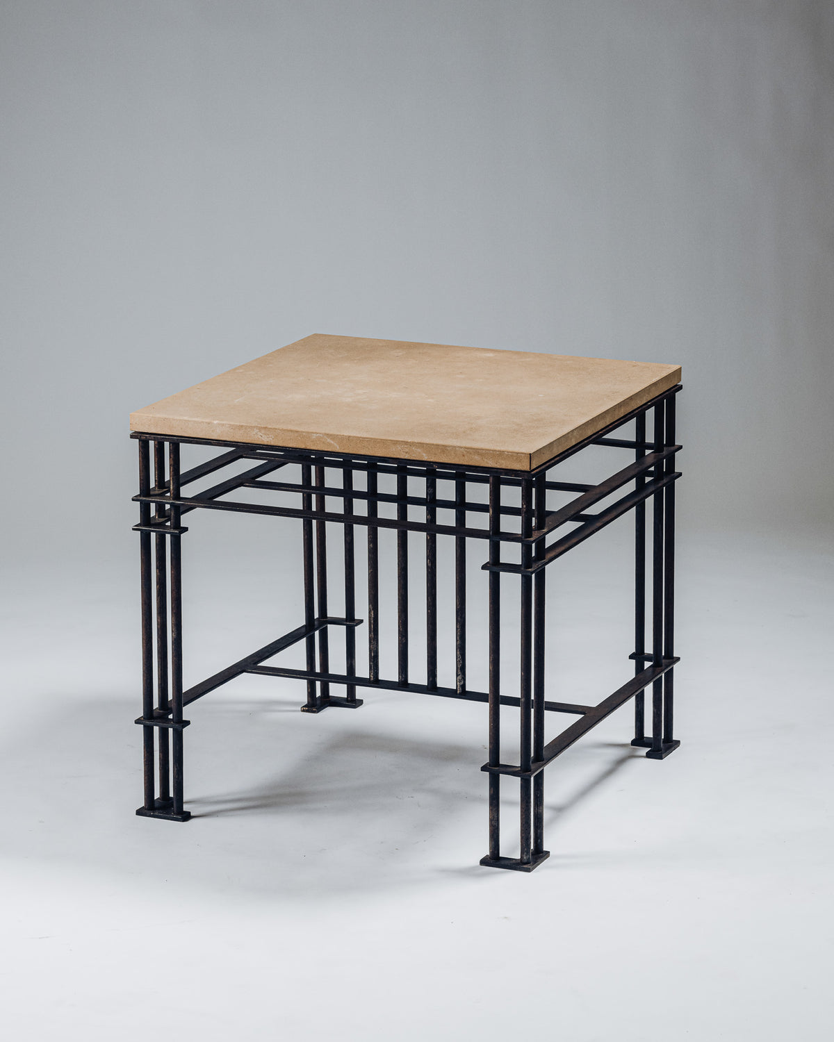 SIDE TABLE IN WROUGHT IRON AND LIMESTONE, JEAN-MICHEL WILMOTTE, 1980s