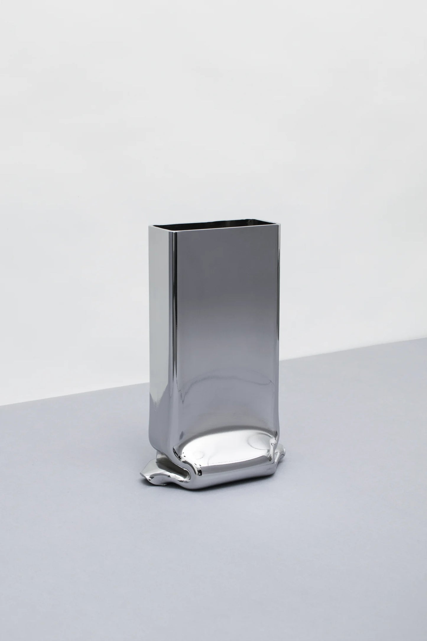 SMALL RECTANGULAR "PRESSURE" CHROME VASE