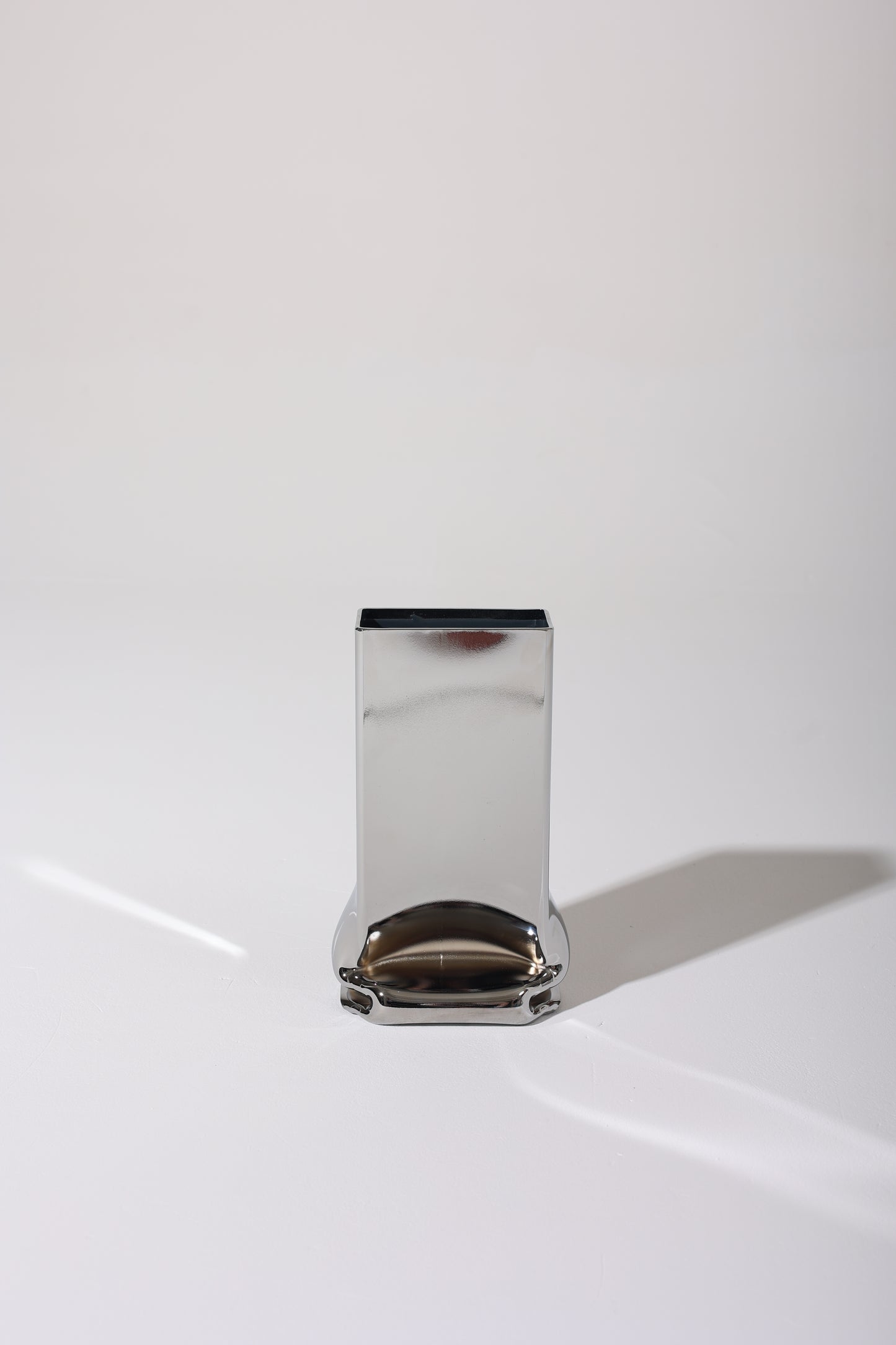 SMALL RECTANGULAR "PRESSURE" CHROME VASE