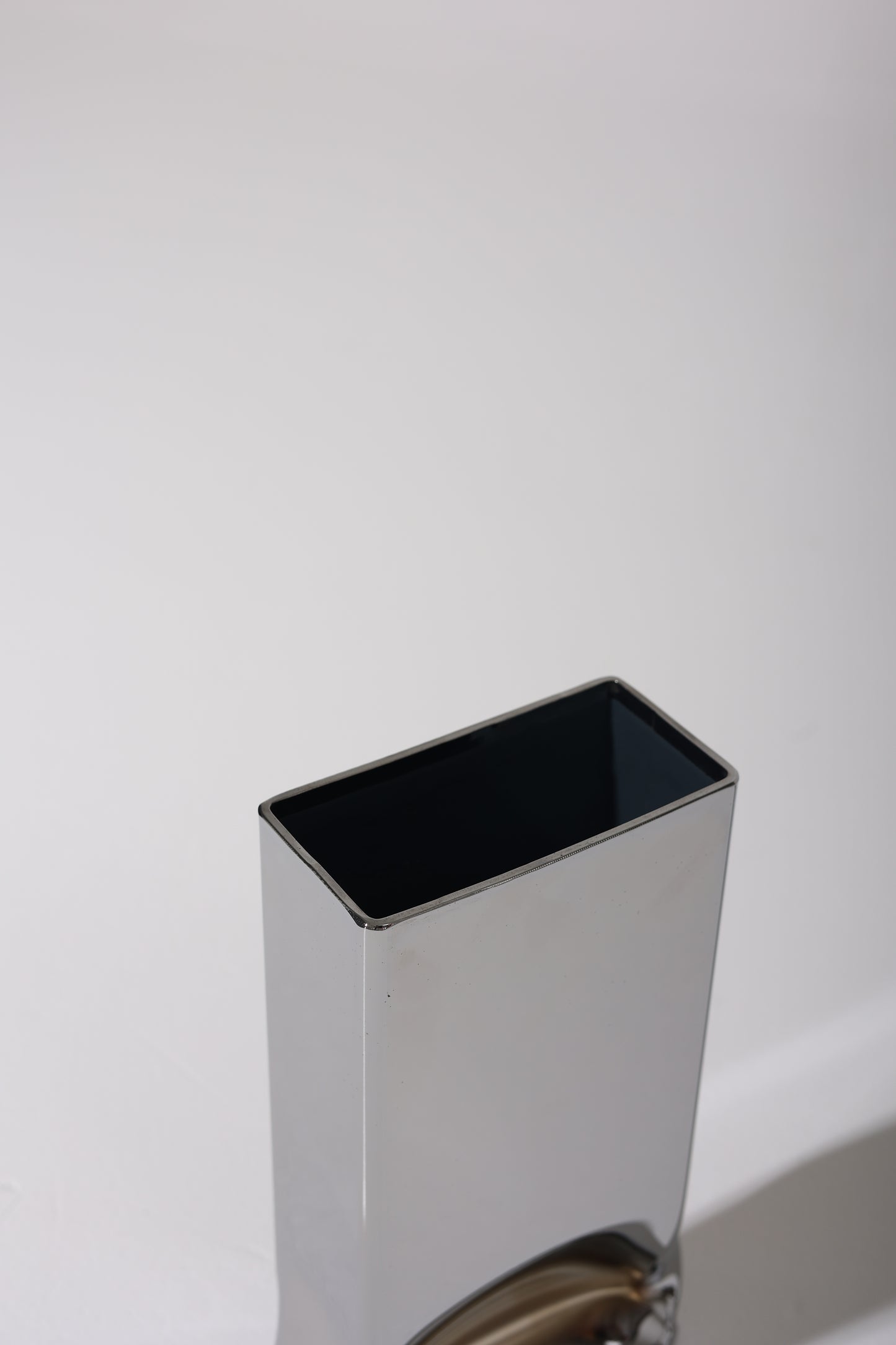 SMALL RECTANGULAR "PRESSURE" CHROME VASE