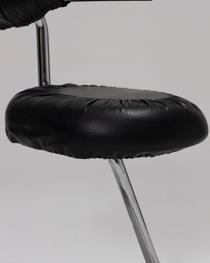 “COBRA” CHAIR IN BLACK LEATHER, GIOTTO STOPPINO, 1970s