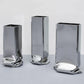 SMALL RECTANGULAR "PRESSURE" CHROME VASE