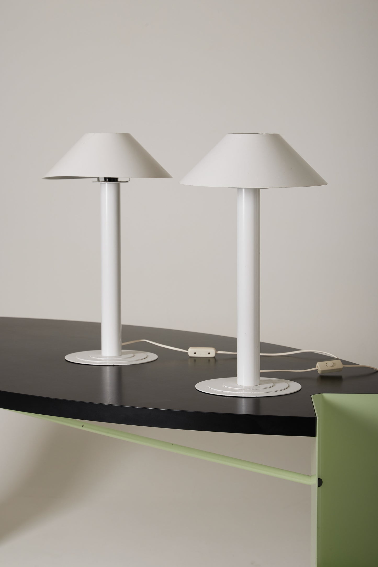 PAIR OF WHITE BENT KARLBY LAMPS