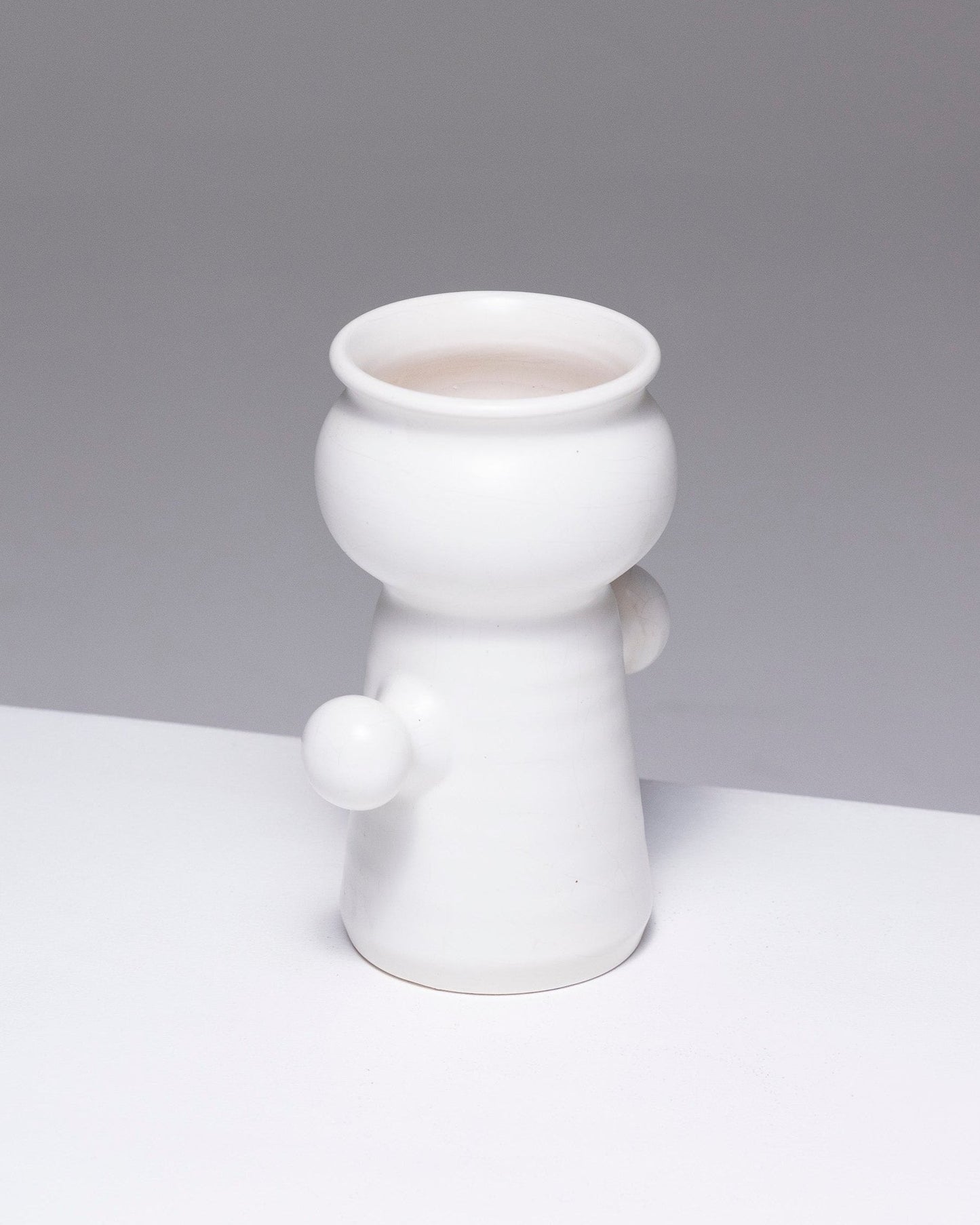 MATT WHITE EARTHENWARE VASE, 1970s