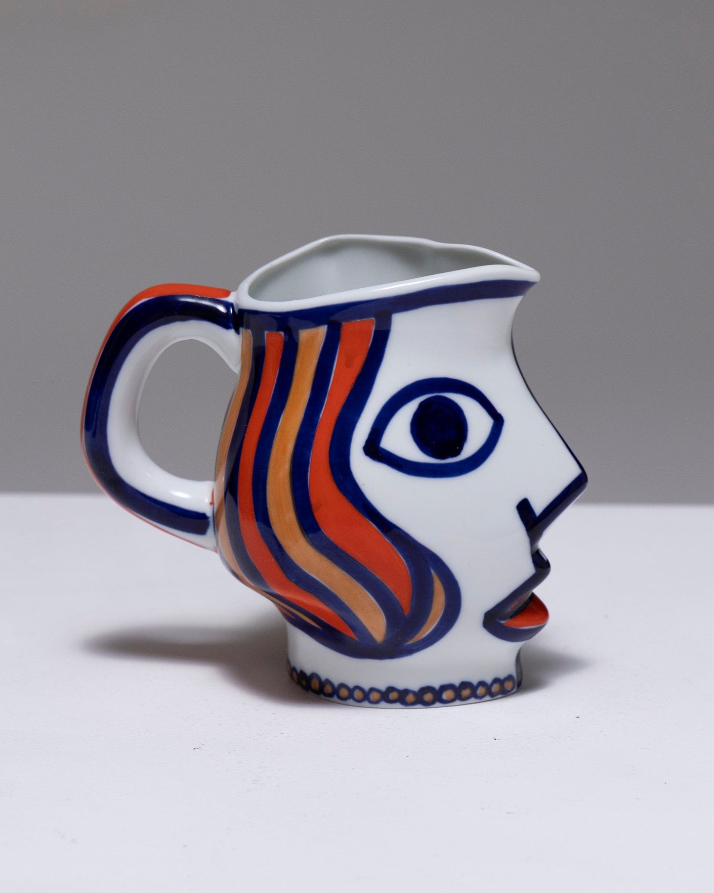 TWO YING-YANG PORCELAIN PITCHER, O. CASTRO, 2000s