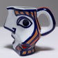 TWO YING-YANG PORCELAIN PITCHER, O. CASTRO, 2000s