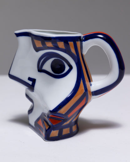 TWO YING-YANG PORCELAIN PITCHER, O. CASTRO, 2000s