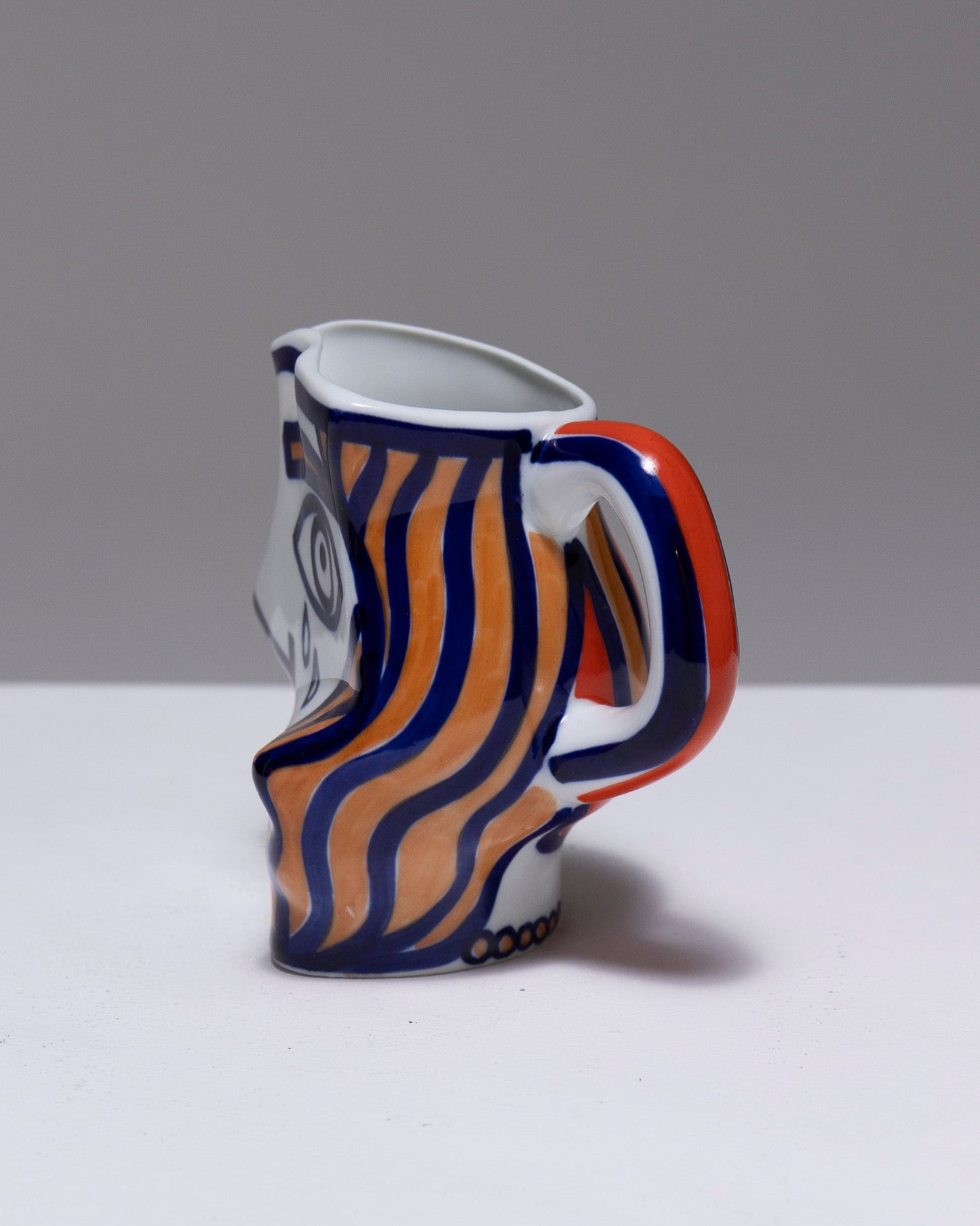 TWO YING-YANG PORCELAIN PITCHER, O. CASTRO, 2000s