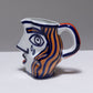 TWO YING-YANG PORCELAIN PITCHER, O. CASTRO, 2000s