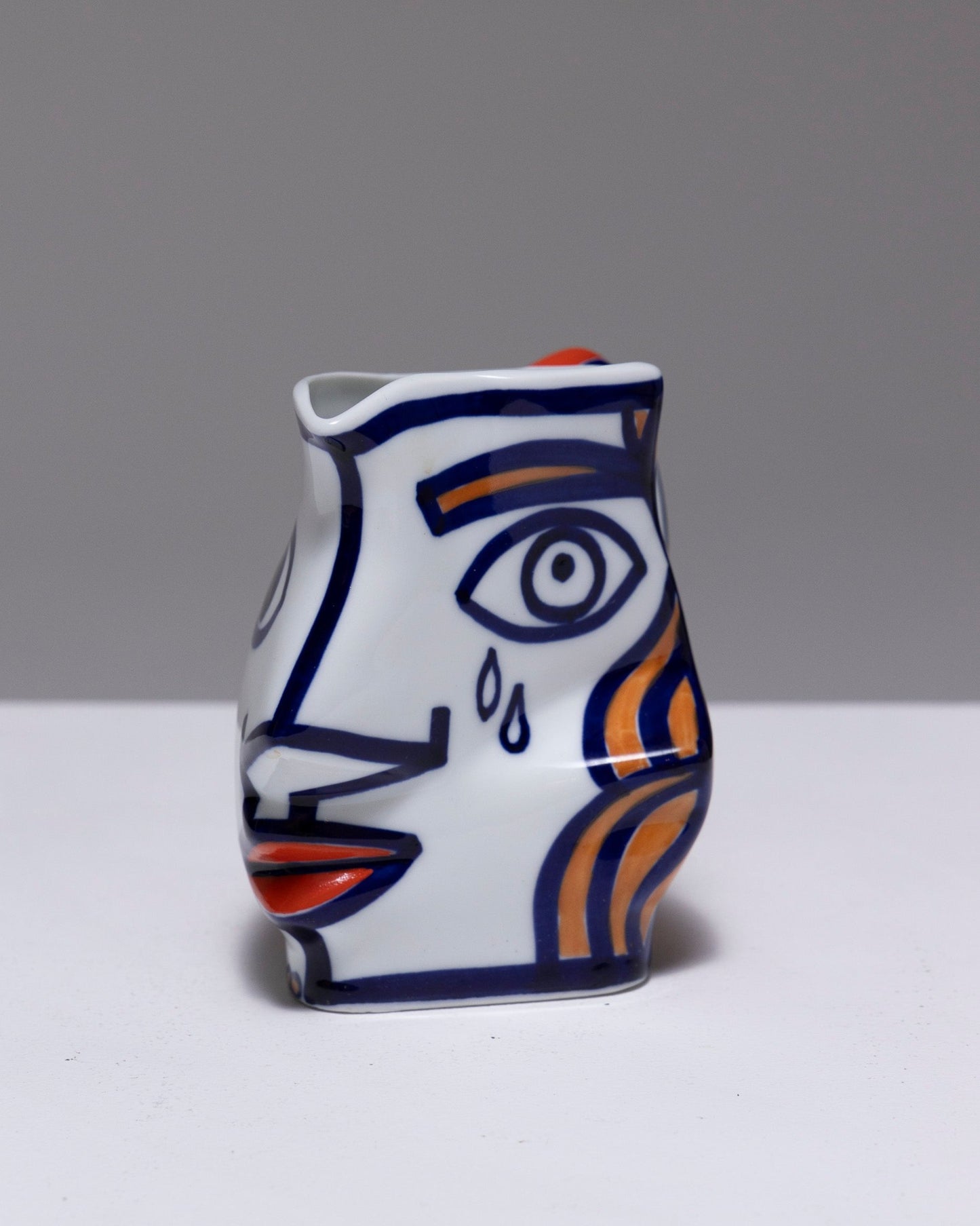 TWO YING-YANG PORCELAIN PITCHER, O. CASTRO, 2000s