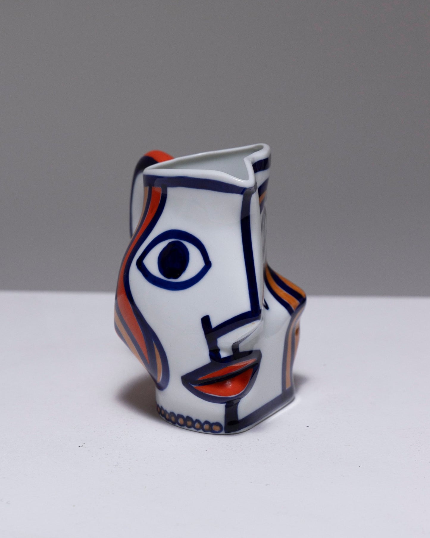 TWO YING-YANG PORCELAIN PITCHER, O. CASTRO, 2000s