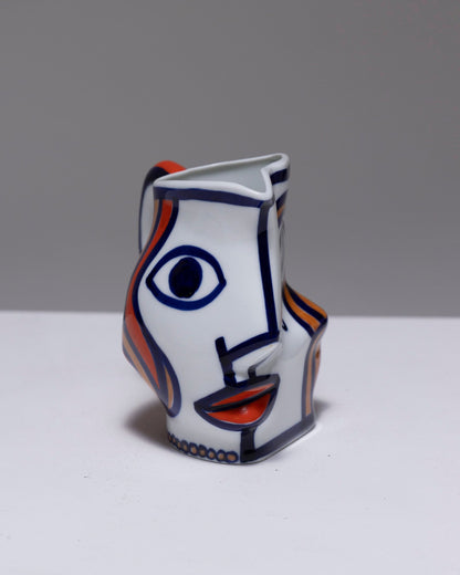 TWO YING-YANG PORCELAIN PITCHER, O. CASTRO, 2000s