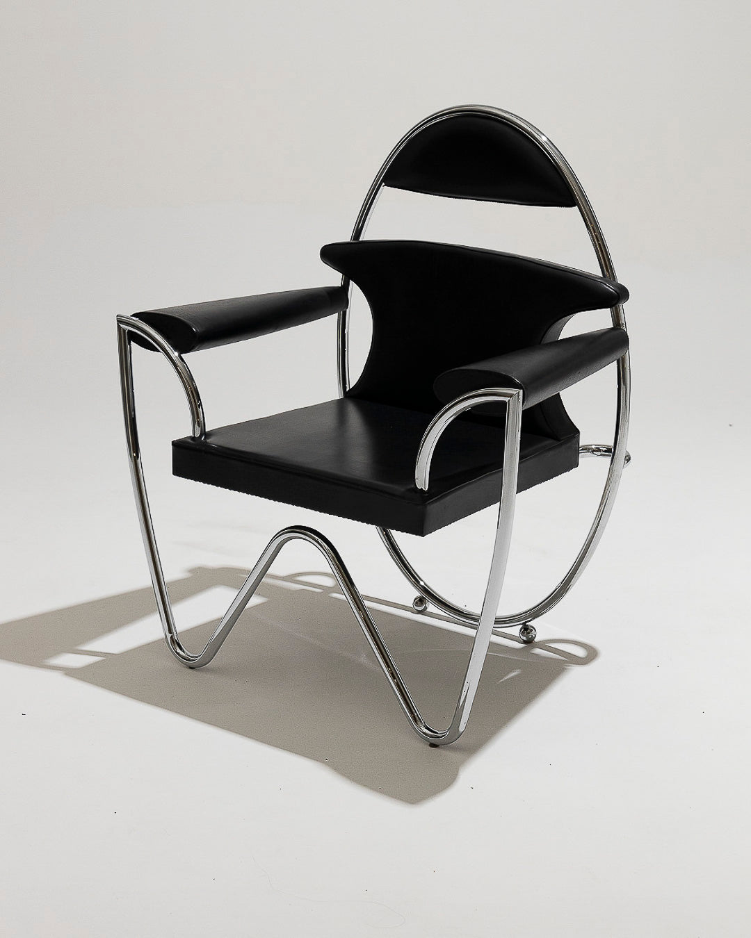 ITALIAN BLACK LEATHER ARMCHAIR, 1980s