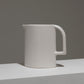 MATT WHITE EARTHENWARE PITCHER, 1970s