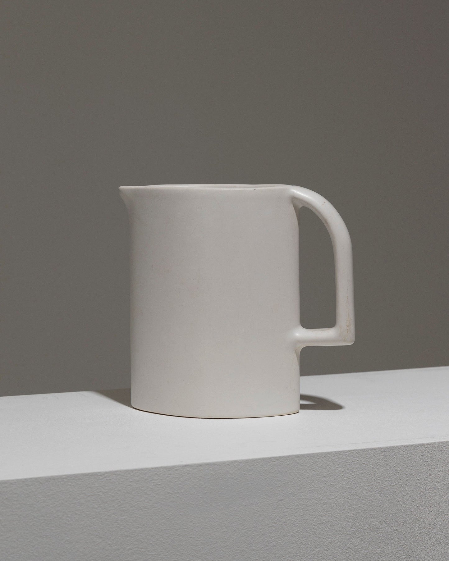 MATT WHITE EARTHENWARE PITCHER, 1970s