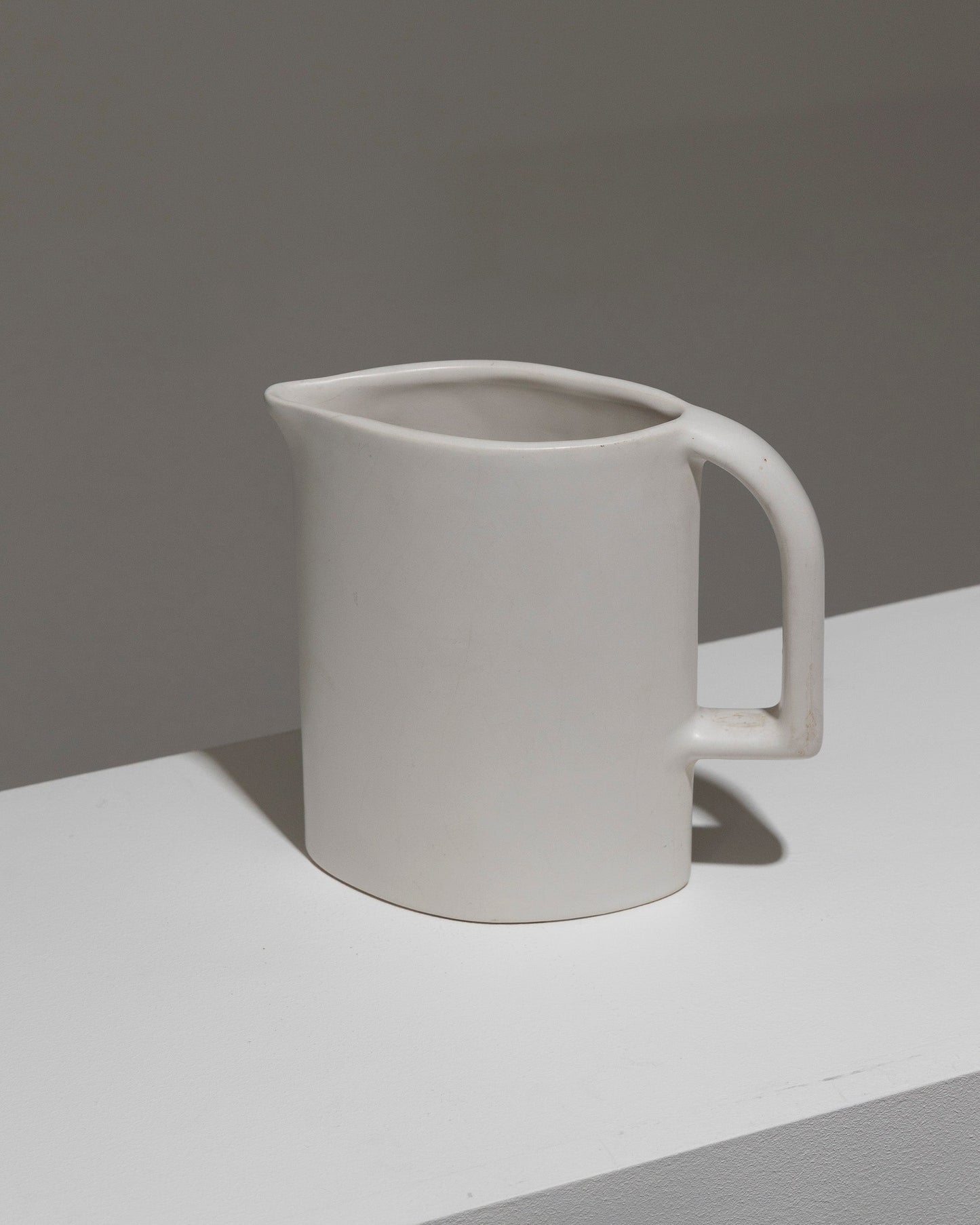 MATT WHITE EARTHENWARE PITCHER, 1970s