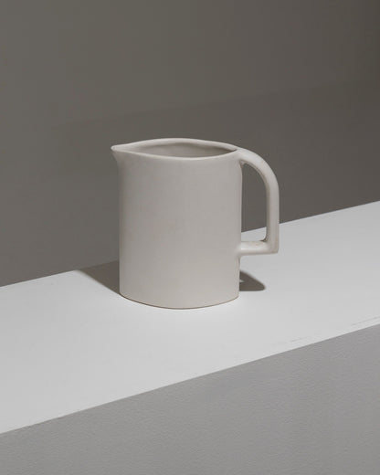 MATT WHITE EARTHENWARE PITCHER, 1970s