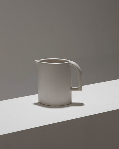 MATT WHITE EARTHENWARE PITCHER, 1970s