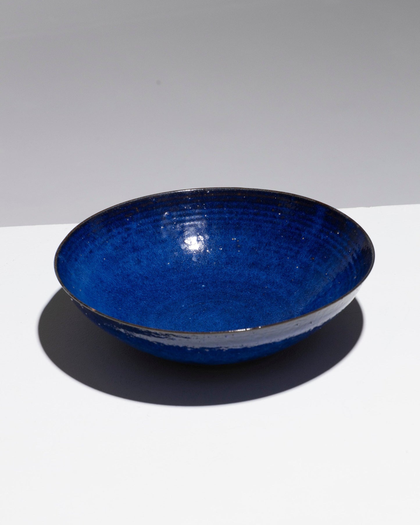 CIRCULAR CUP IN BLUE EARTHENWARE, DEQUEKER, 1960s