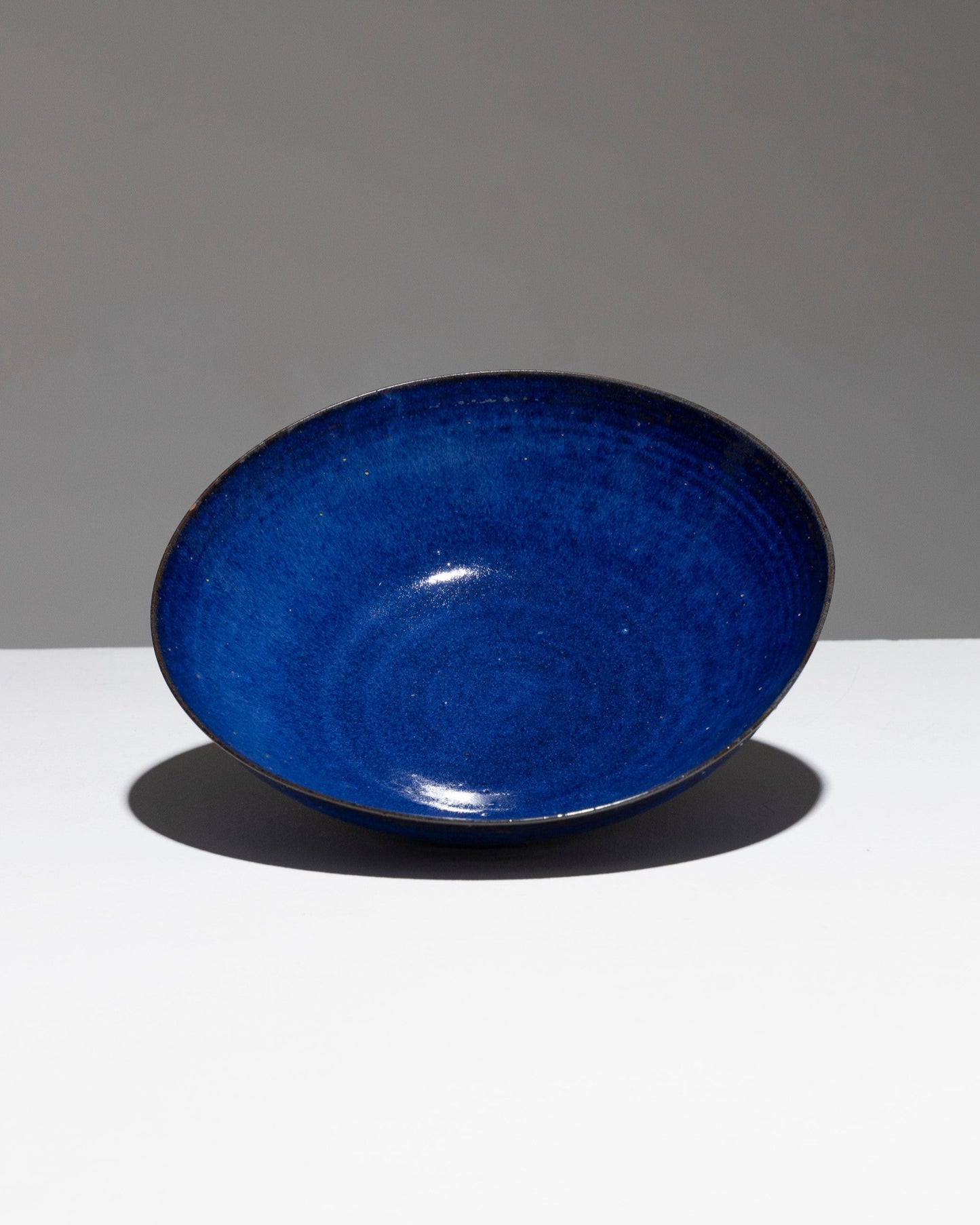 CIRCULAR CUP IN BLUE EARTHENWARE, DEQUEKER, 1960s