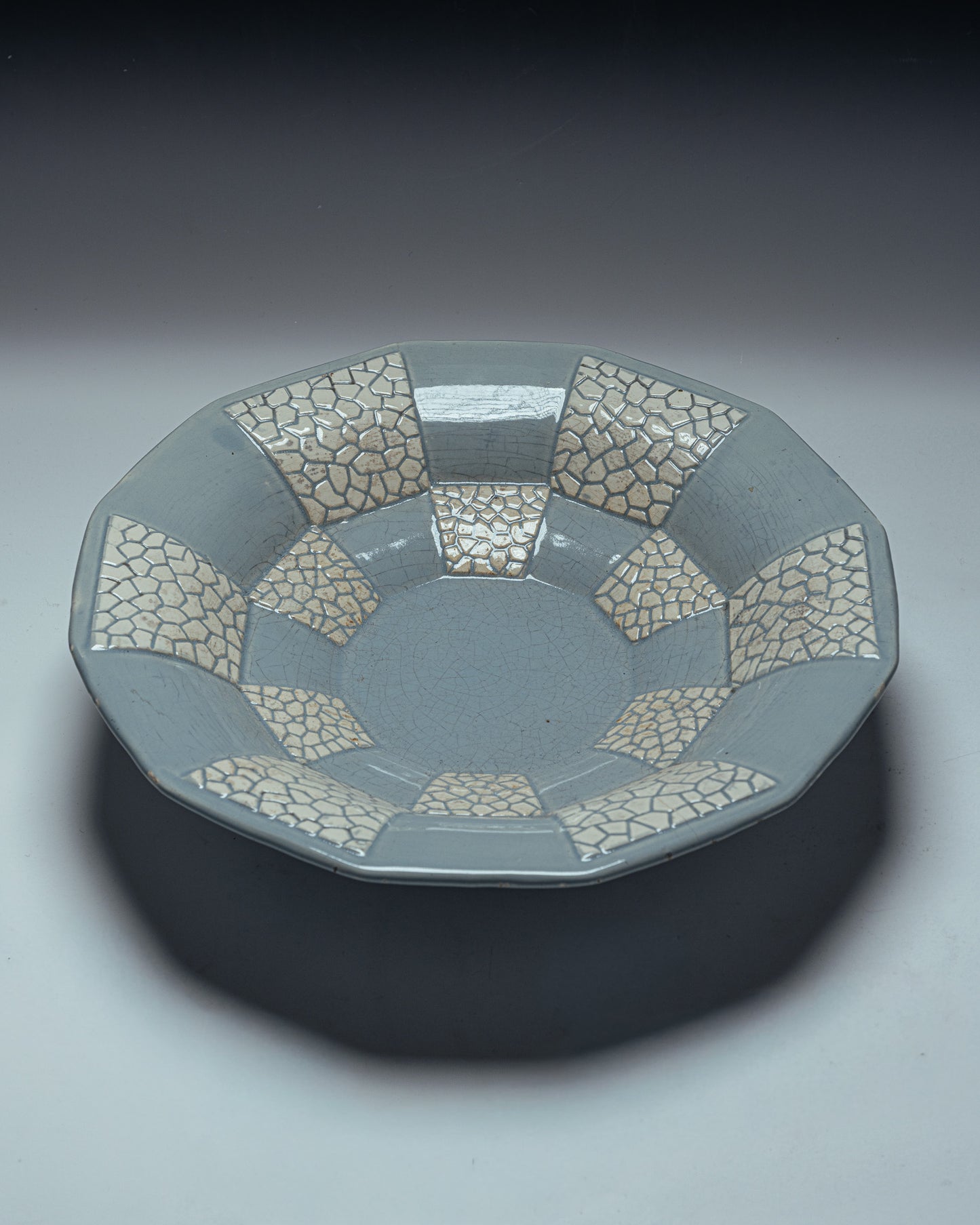 DODECAGONAL BOWL ON A FAIENCE PEDESTAL, 1950s