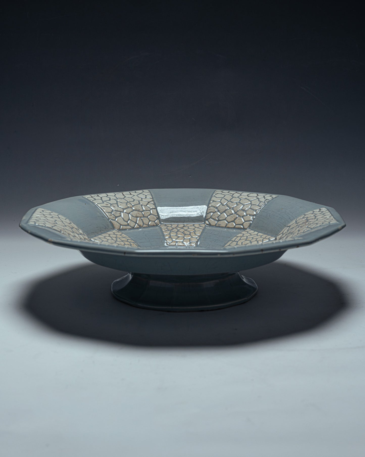 DODECAGONAL BOWL ON A FAIENCE PEDESTAL, 1950s