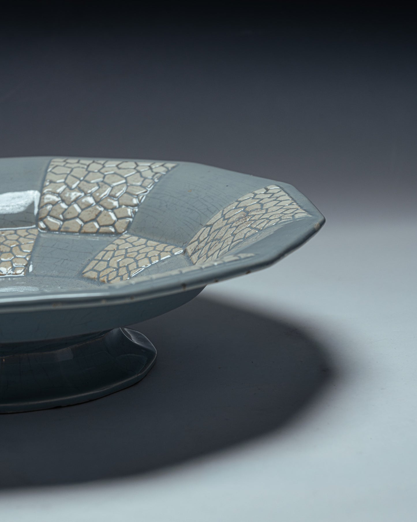 DODECAGONAL BOWL ON A FAIENCE PEDESTAL, 1950s