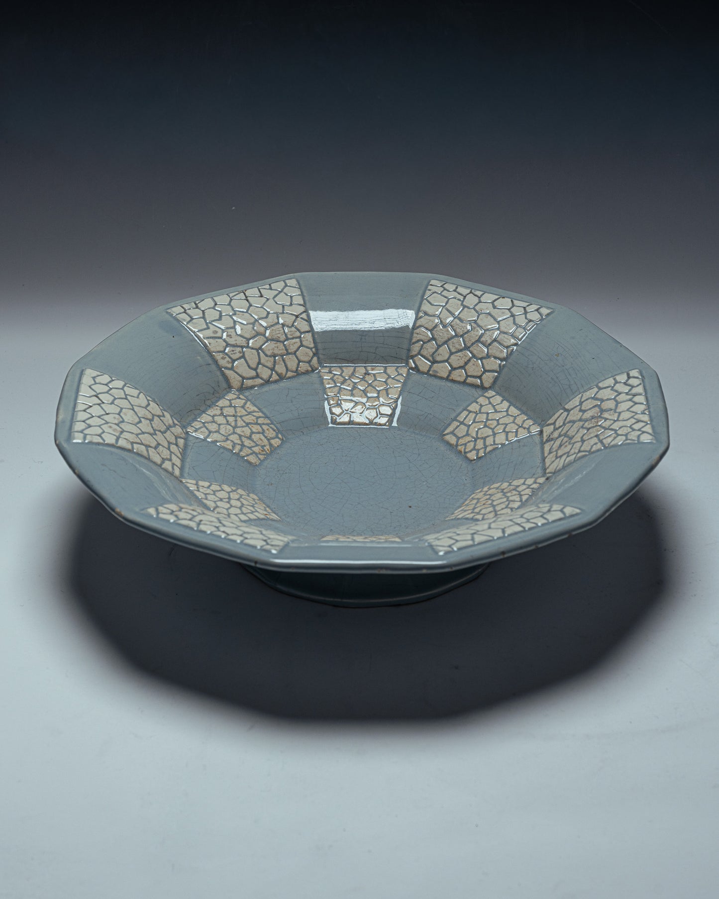 DODECAGONAL BOWL ON A FAIENCE PEDESTAL, 1950s