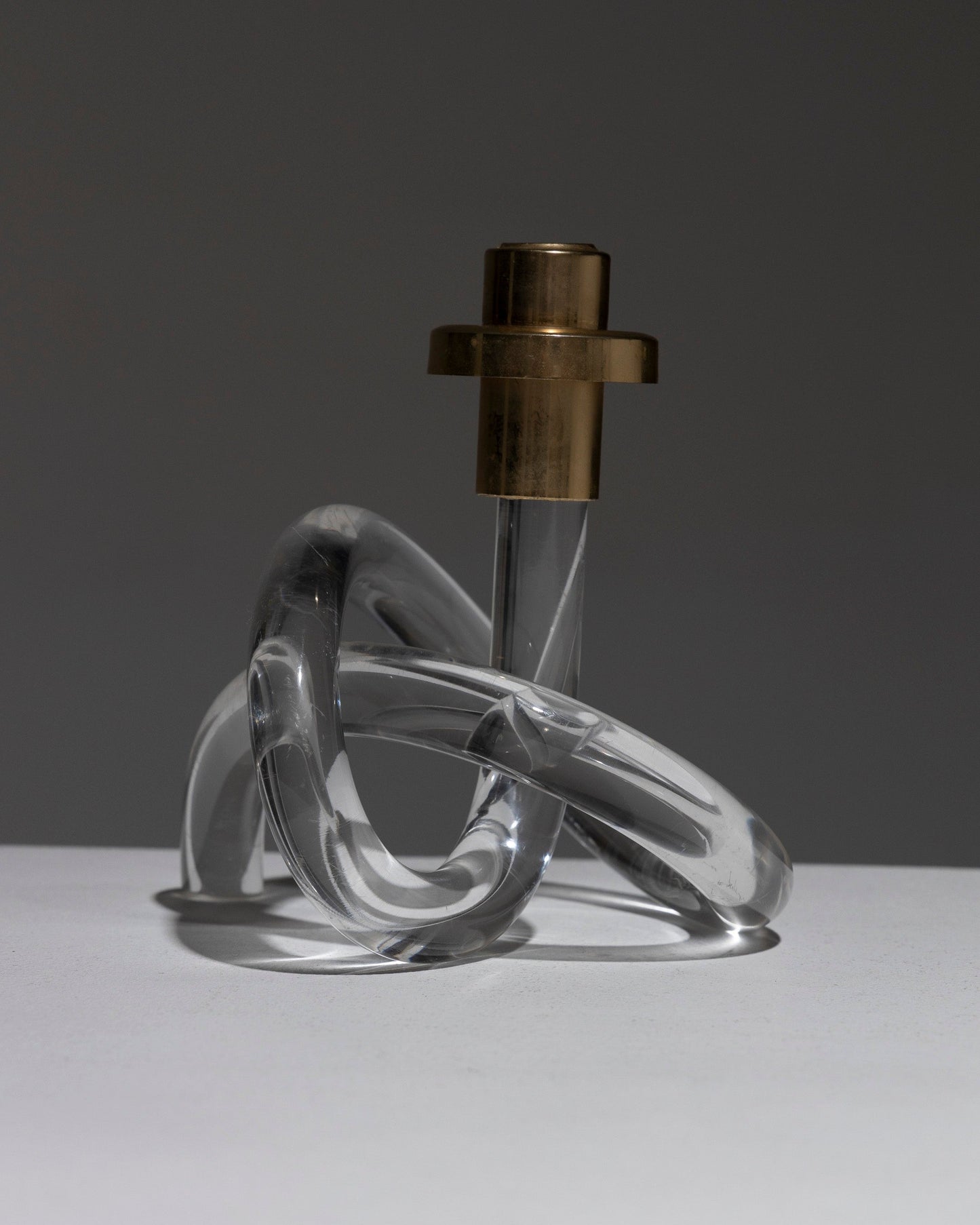 PLEXIGLAS AND BRASS LOOP CANDLE HOLDER, DOROTHY C. THORPE, 1980s