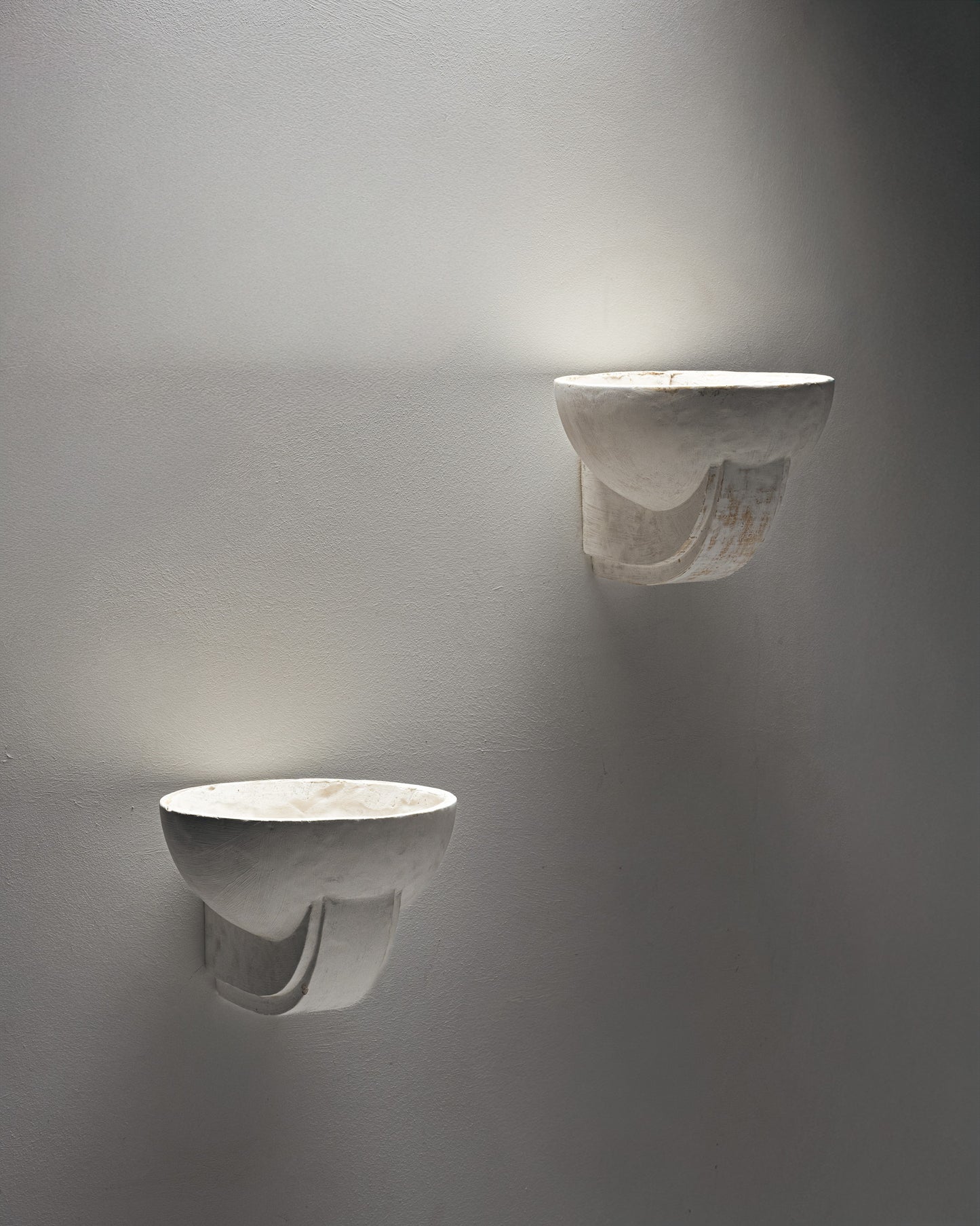 PAIR OF PLASTER WALL SCONCES, 1940s