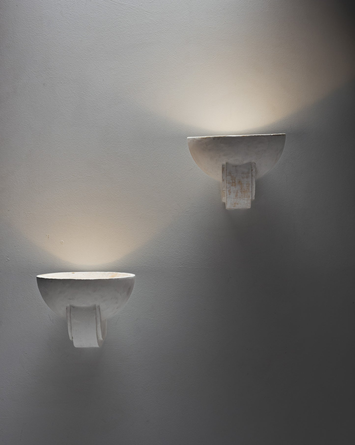 PAIR OF PLASTER WALL SCONCES, 1940s