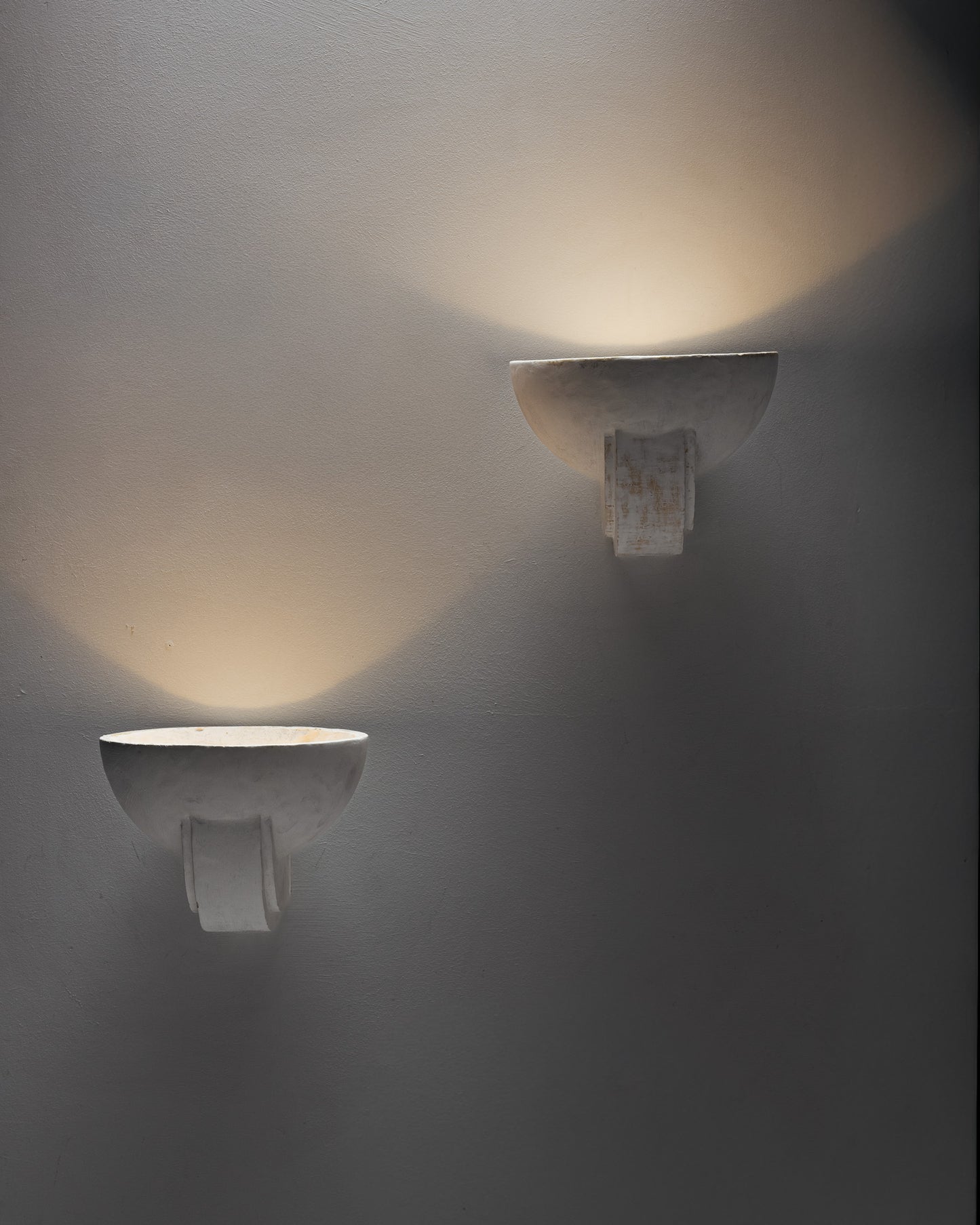 PAIR OF PLASTER WALL SCONCES, 1940s