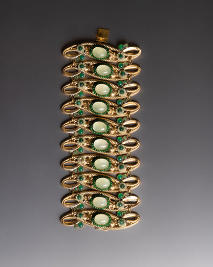 BRACELET EN MÉTAL DORÉ ET PIERRES