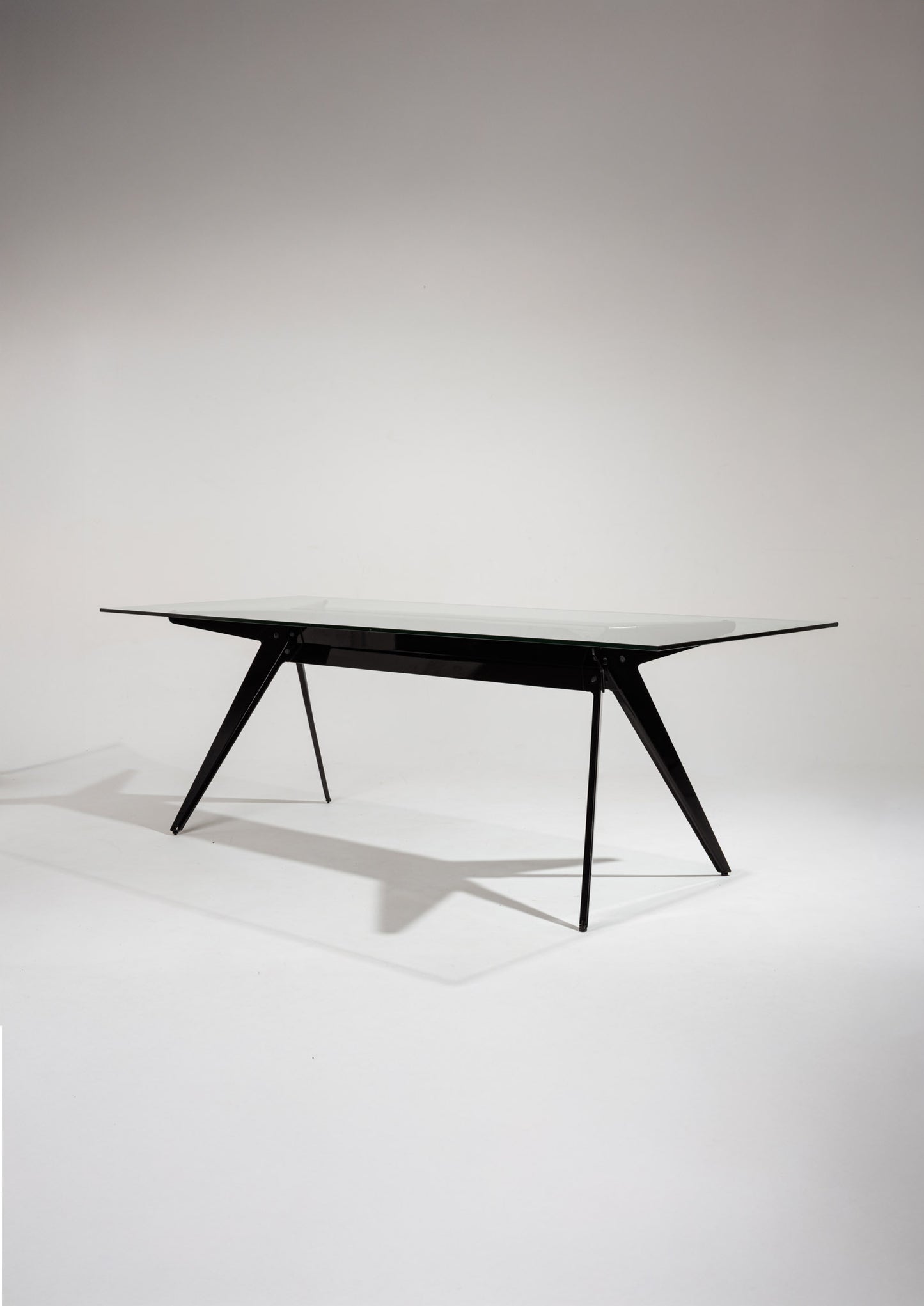 Black glass and metal compass table, 2000s