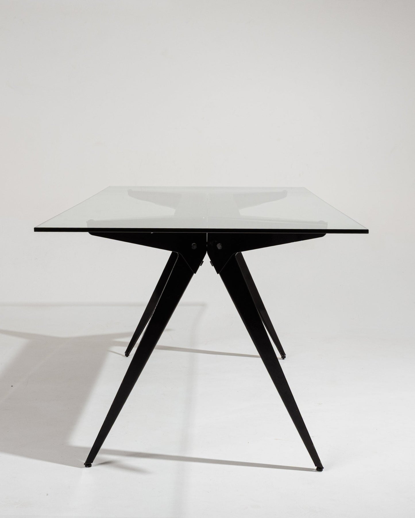 Black glass and metal compass table, 2000s