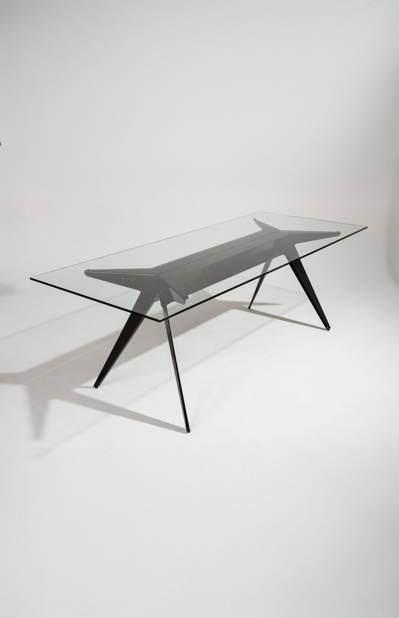 Black glass and metal compass table, 2000s