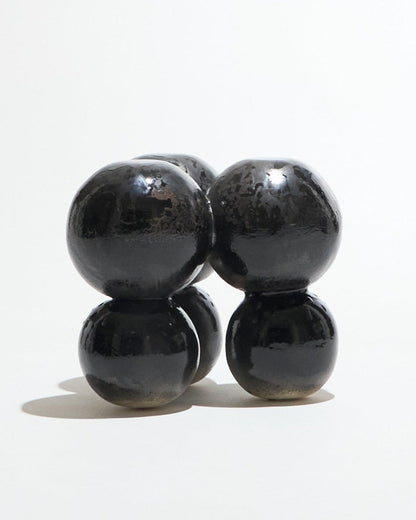 TABOURET AWKWARD EN GRÈS NOIR MÉTALLIQUE