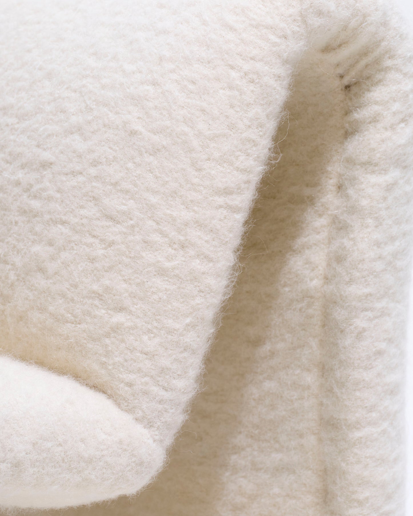 Pair of armless lounge chairs in white woolen fabric, Etienne Fermigier, 1970s