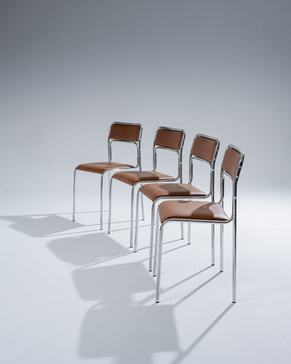 SET OF 4 CHAIRS IN TUBULAR STEEL AND COGNAC LEATHERETTE, 1980s